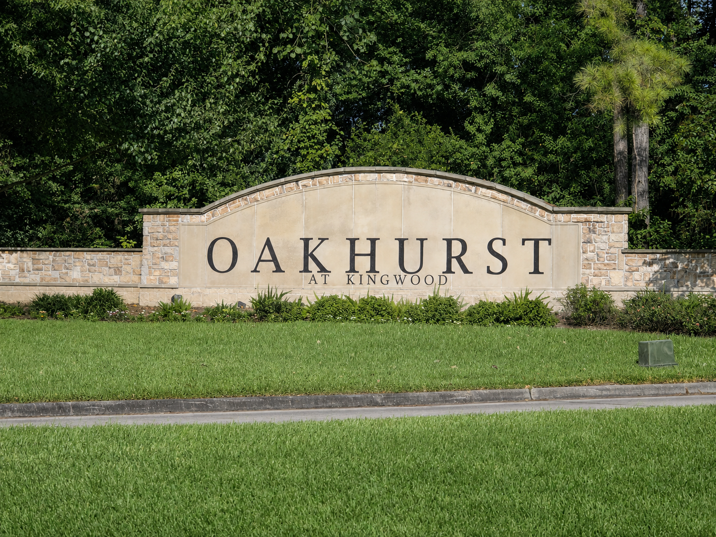 Oakhurst at Kingwood community entrance sign in Porter, TX
